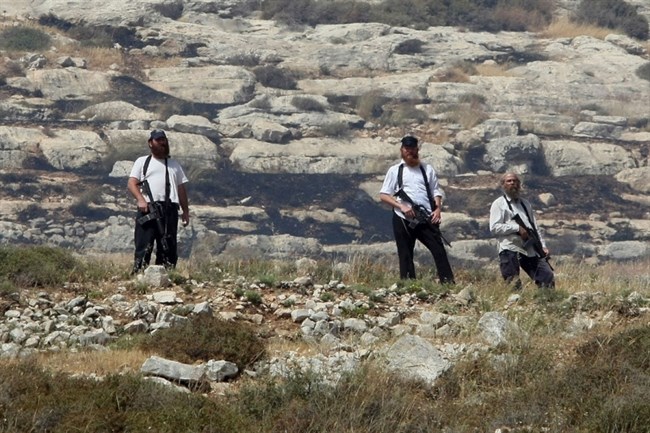 Nazi Jewish Colonizers Shoot at Palestinian