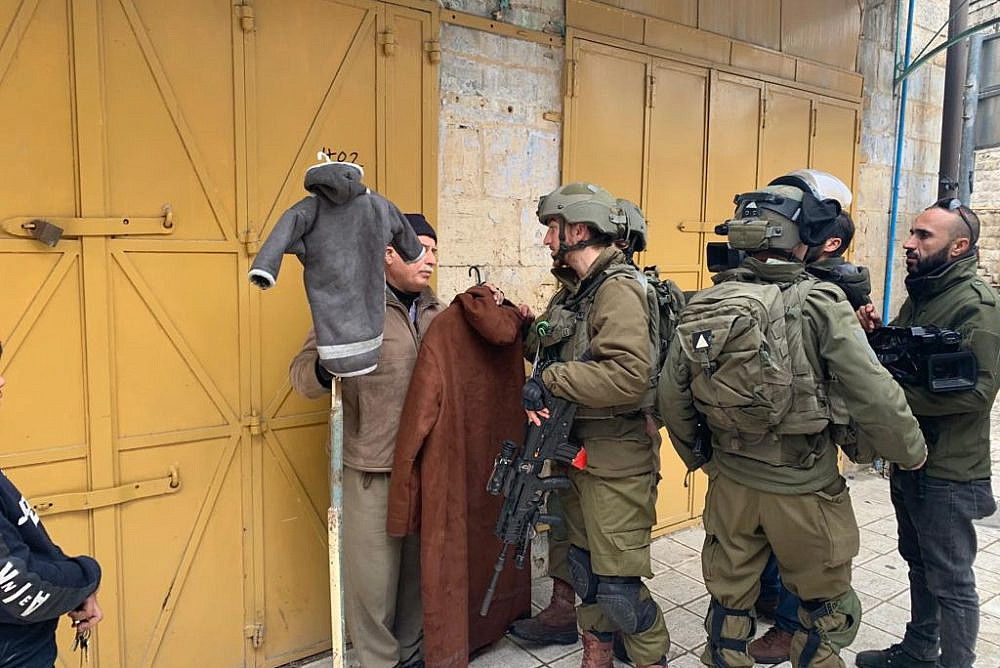 Israeli soldiers force closure of Palestinian stores in Hebron’s Old City